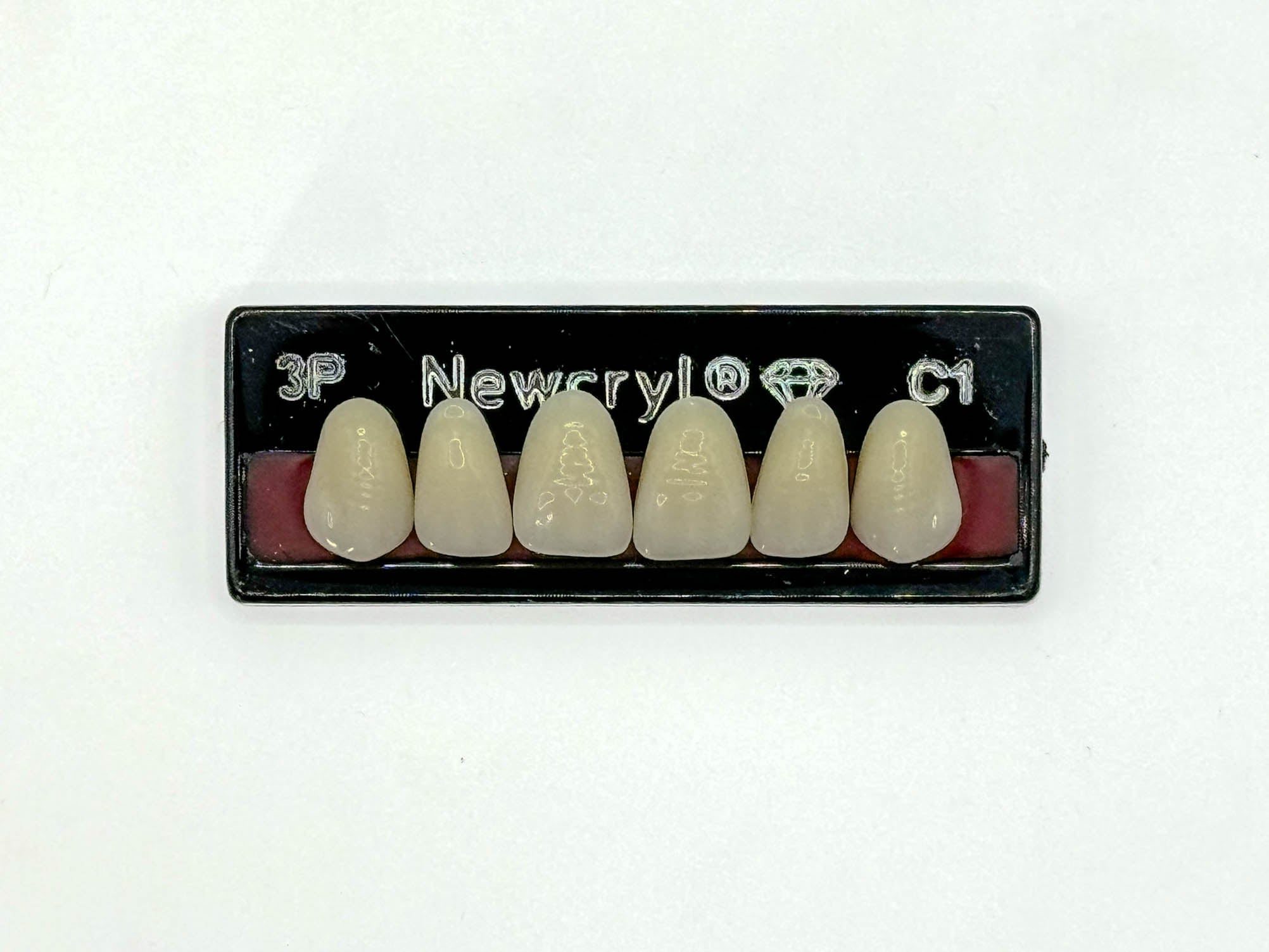 Dientes newcryl x 6 sa 3p col c1