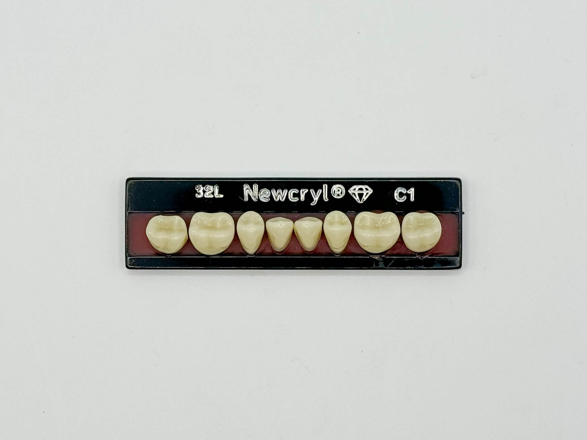 Dientes newcryl x 8 ip 32l col c1