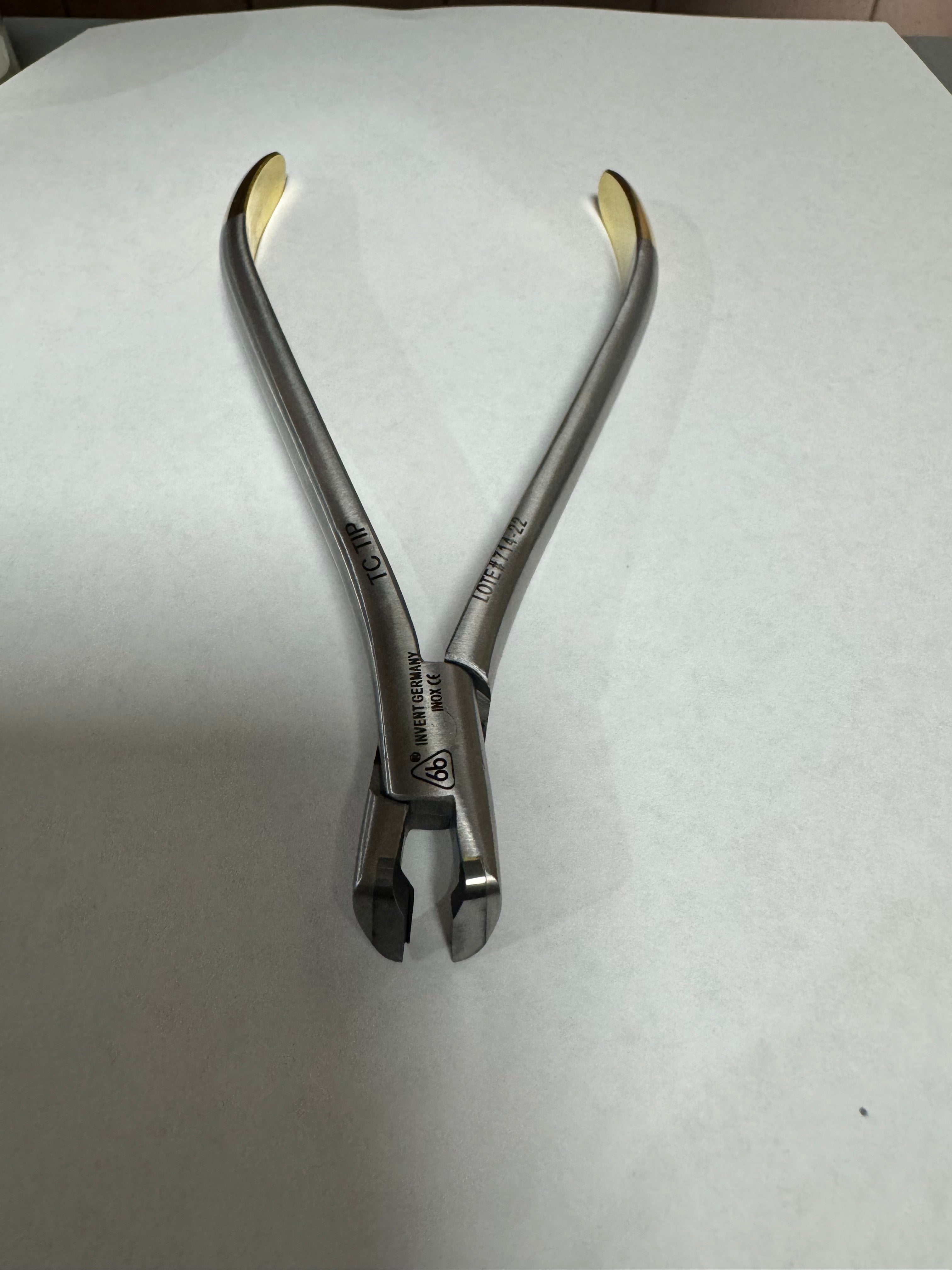 Pinza distal c/ret punta fina 14.5cm